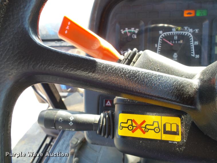 image for item K8234 1998 New Holland 8260 MFWD tractor