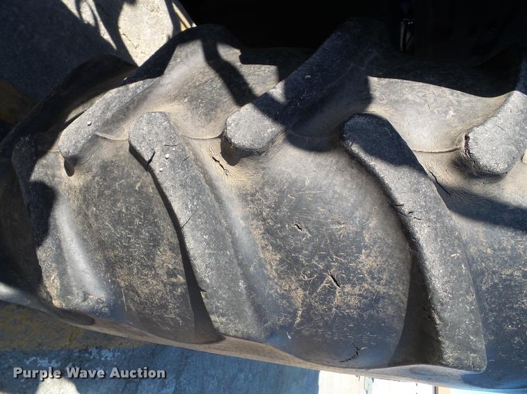 image for item K8234 1998 New Holland 8260 MFWD tractor