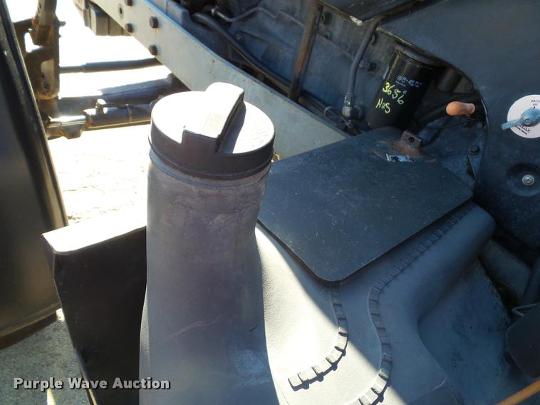 image for item K8234 1998 New Holland 8260 MFWD tractor