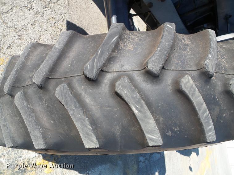 image for item K8234 1998 New Holland 8260 MFWD tractor