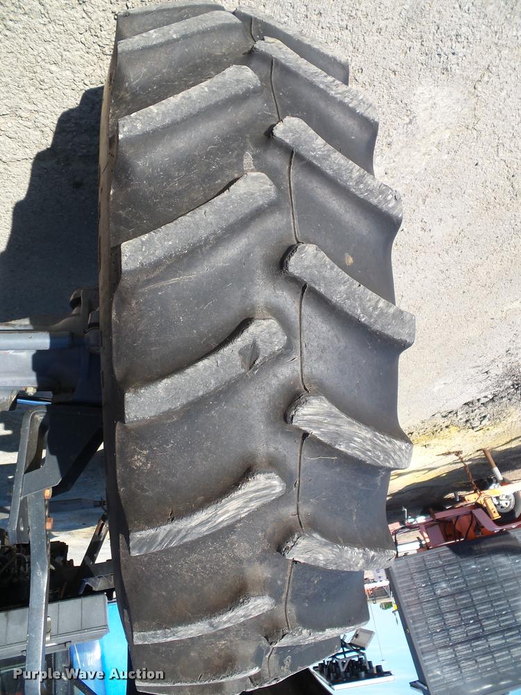 image for item K8234 1998 New Holland 8260 MFWD tractor