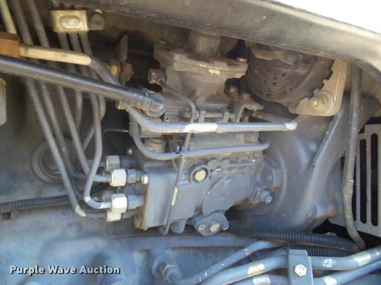 image for item K8234 1998 New Holland 8260 MFWD tractor