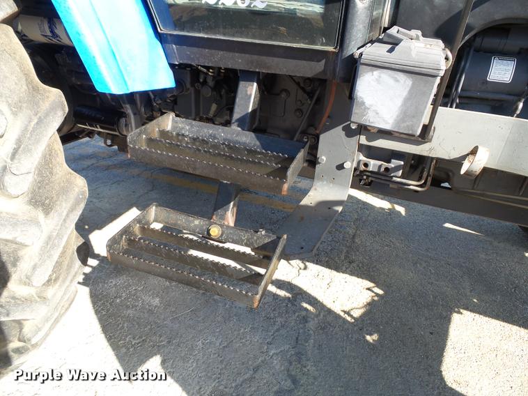 image for item K8234 1998 New Holland 8260 MFWD tractor