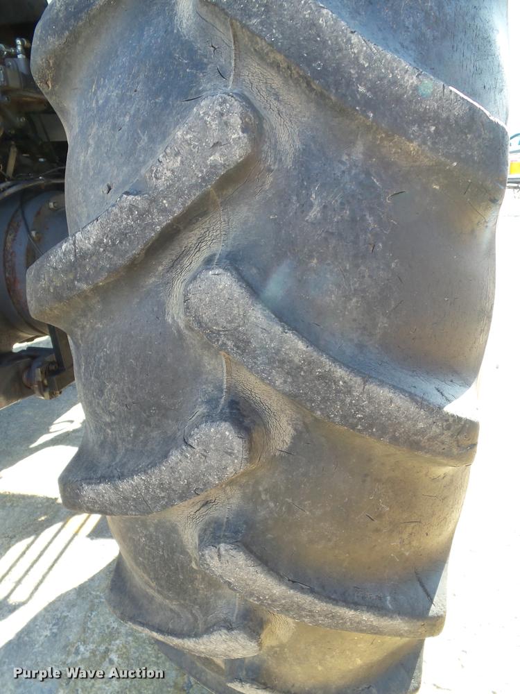 image for item K8234 1998 New Holland 8260 MFWD tractor