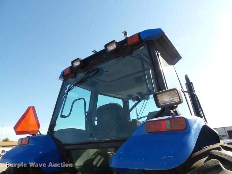 image for item K8234 1998 New Holland 8260 MFWD tractor