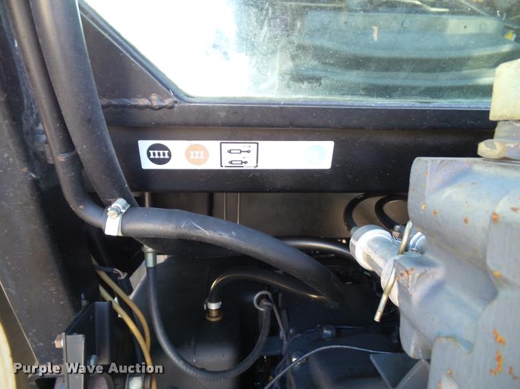 image for item K8234 1998 New Holland 8260 MFWD tractor