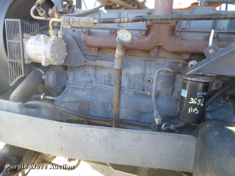 image for item K8234 1998 New Holland 8260 MFWD tractor