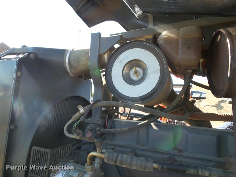 image for item K8234 1998 New Holland 8260 MFWD tractor