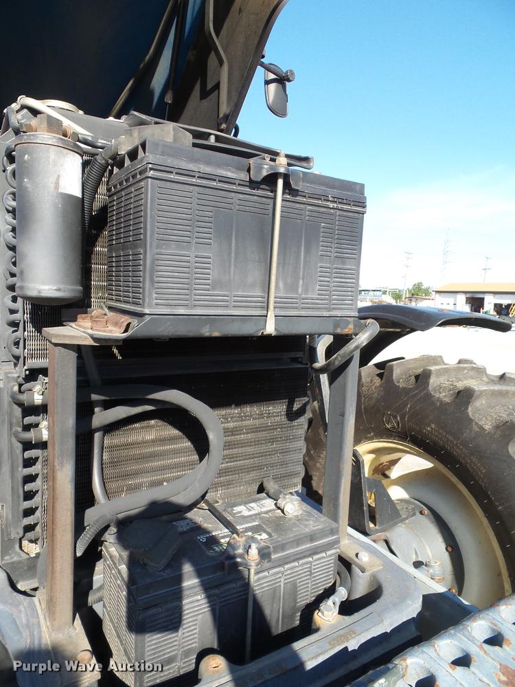 image for item K8234 1998 New Holland 8260 MFWD tractor