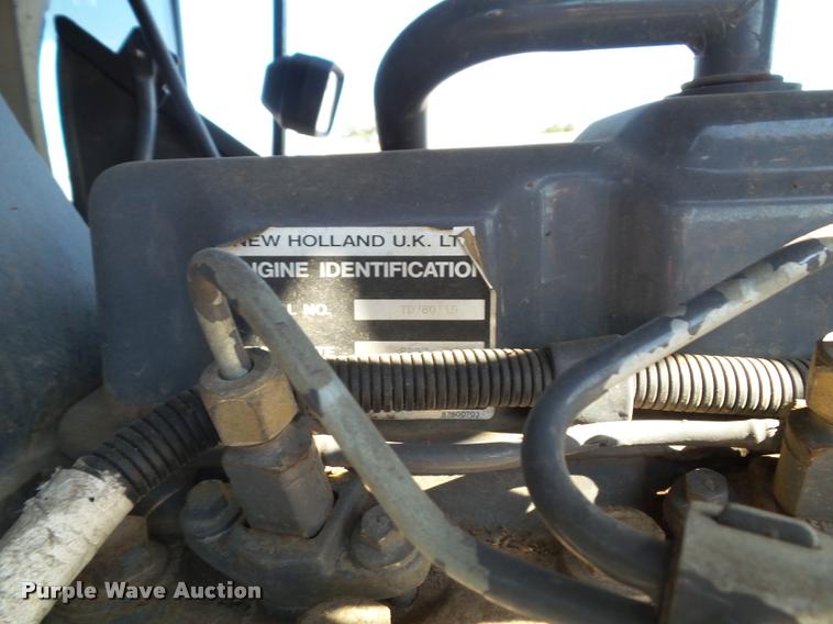 image for item K8234 1998 New Holland 8260 MFWD tractor