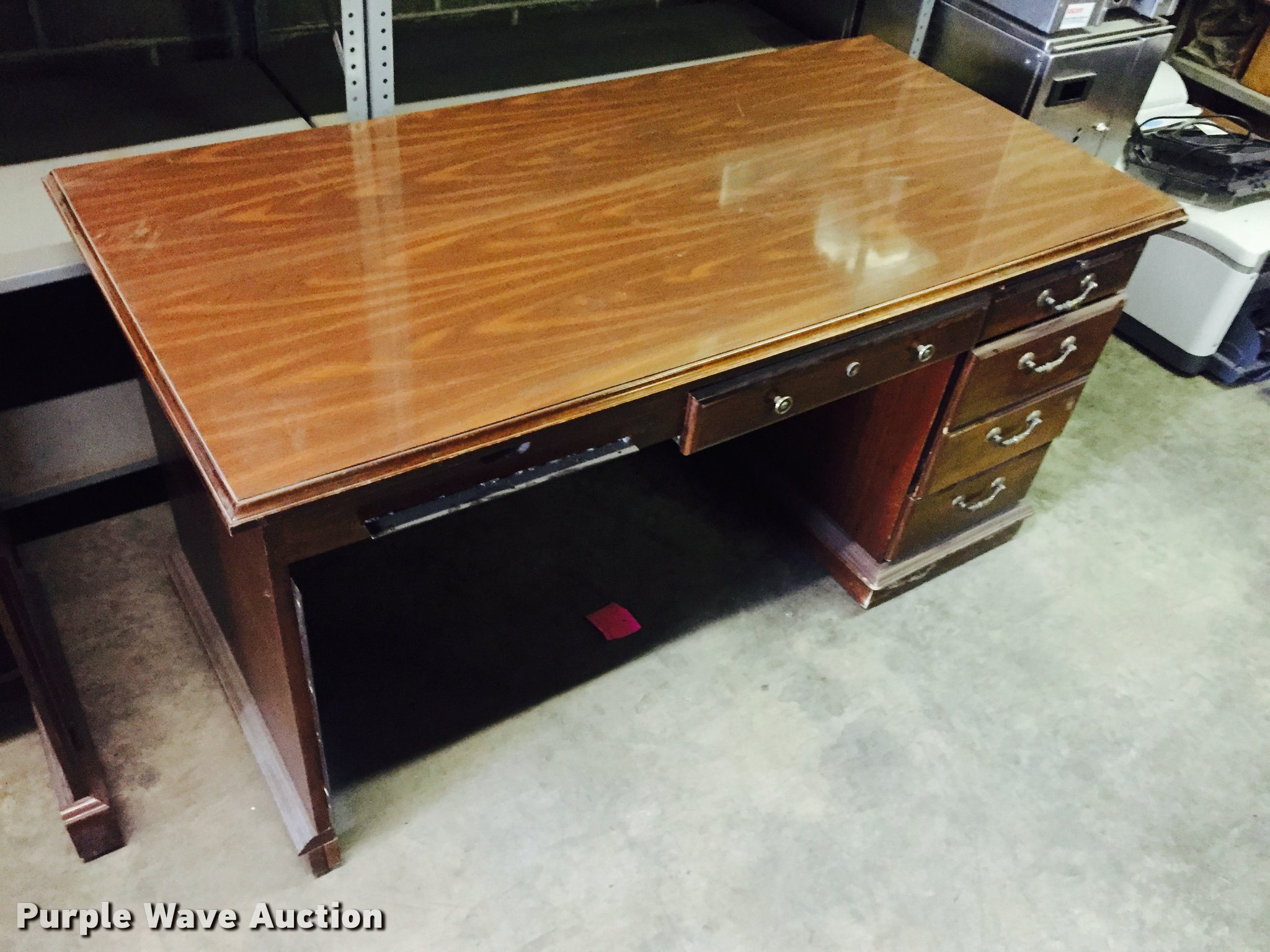 (2) wood desks in Wichita, KS Item CA9941 sold Purple Wave