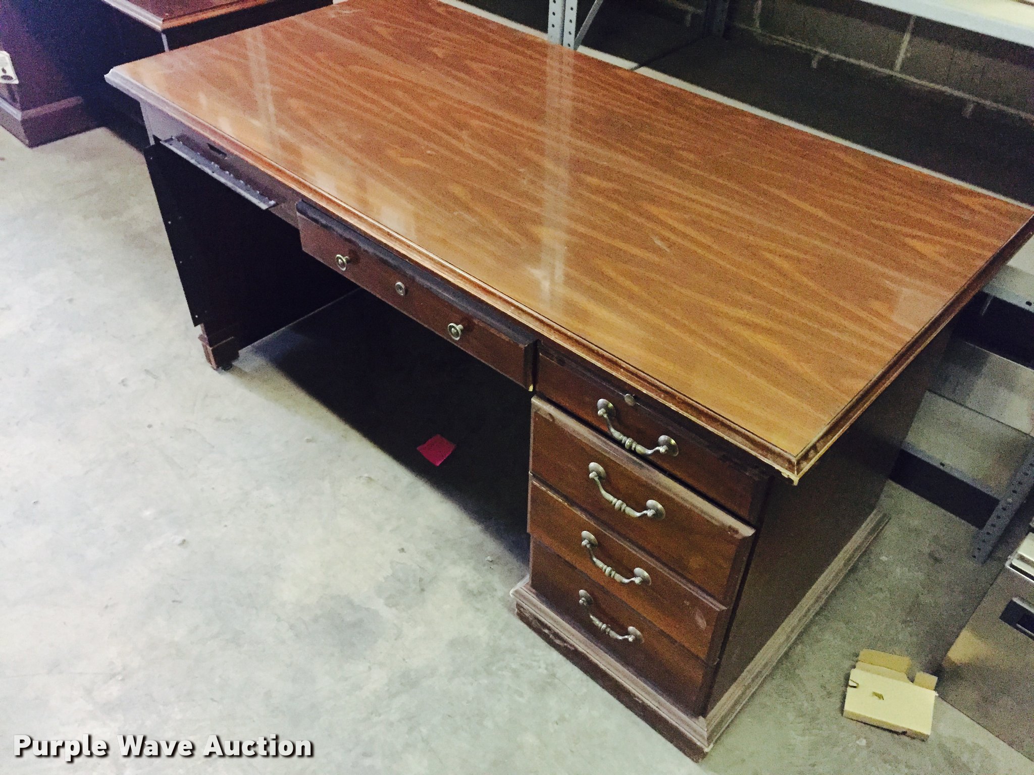 (2) wood desks in Wichita, KS Item CA9941 sold Purple Wave