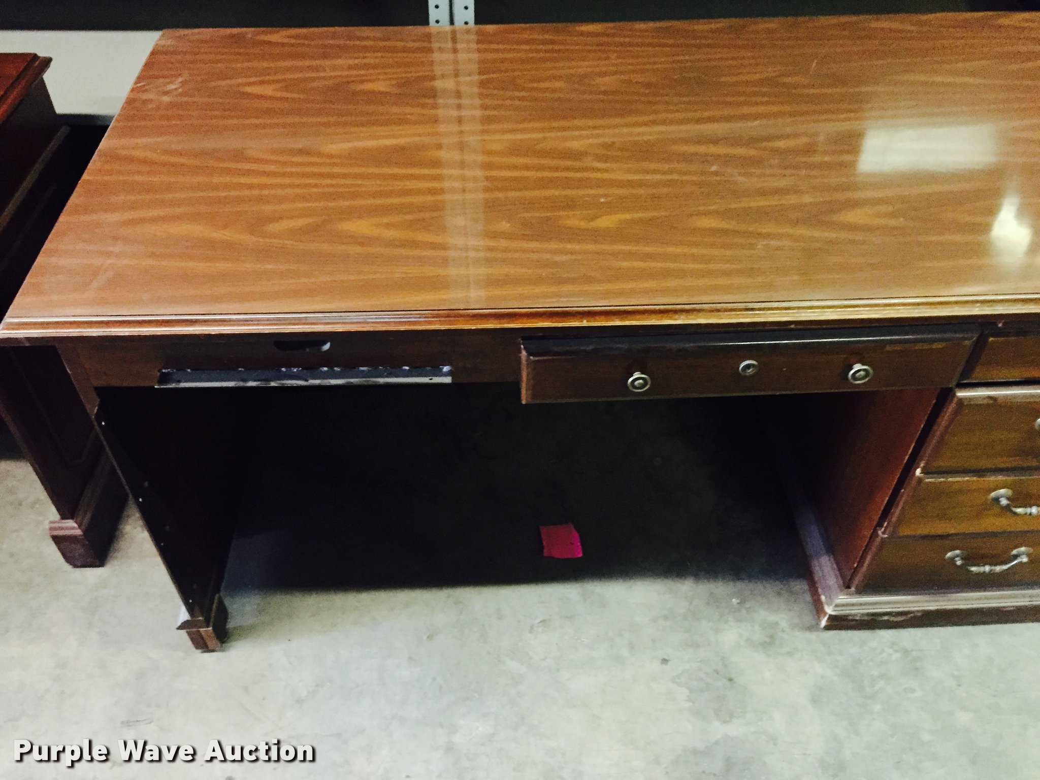 (2) wood desks in Wichita, KS Item CA9941 sold Purple Wave