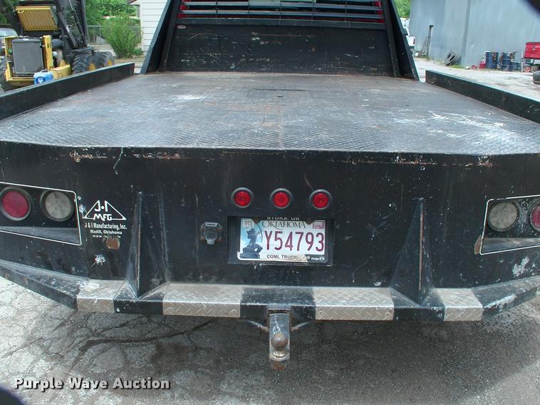 image for item DP9304 2008 Dodge Ram 3500 SLT Quad Cab flatbed pickup truck