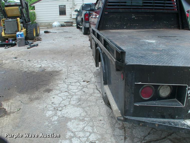 image for item DP9304 2008 Dodge Ram 3500 SLT Quad Cab flatbed pickup truck