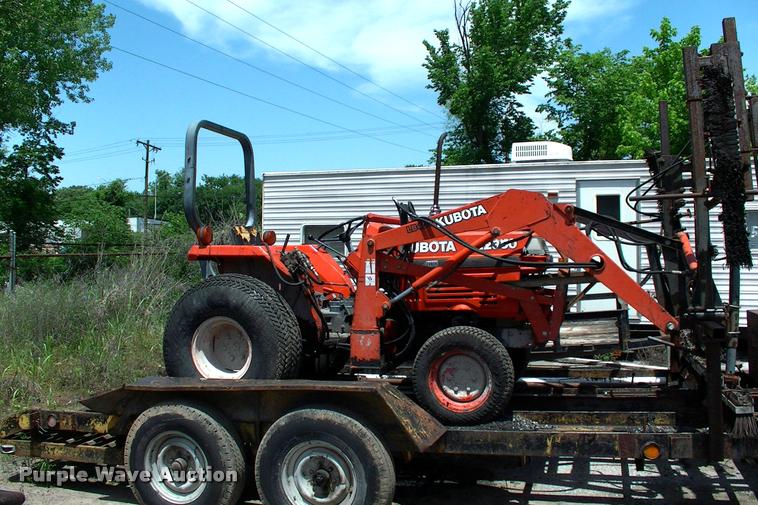 image for item L3128 Kubota L2350 MFWD tractor with petromat attachment