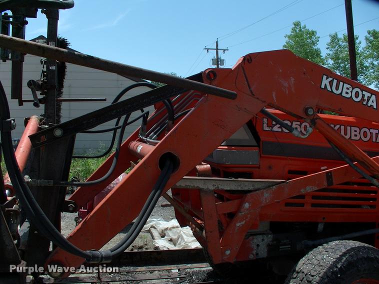image for item L3128 Kubota L2350 MFWD tractor with petromat attachment
