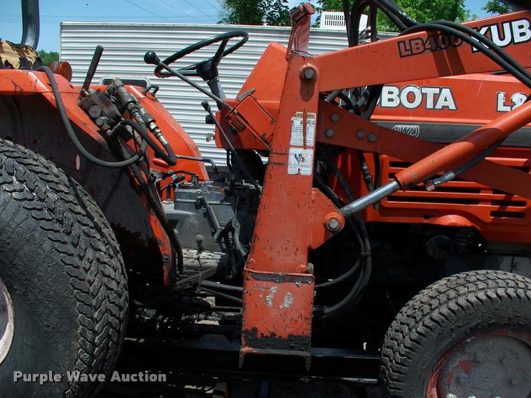 image for item L3128 Kubota L2350 MFWD tractor with petromat attachment