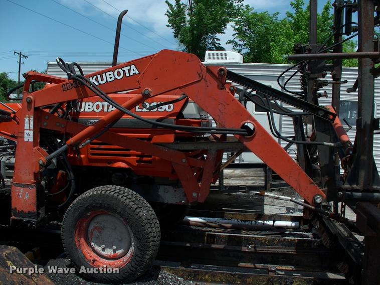 image for item L3128 Kubota L2350 MFWD tractor with petromat attachment