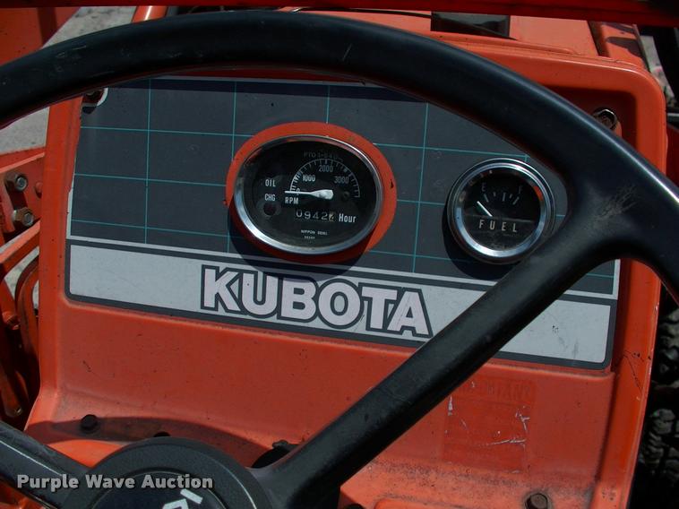 image for item L3128 Kubota L2350 MFWD tractor with petromat attachment
