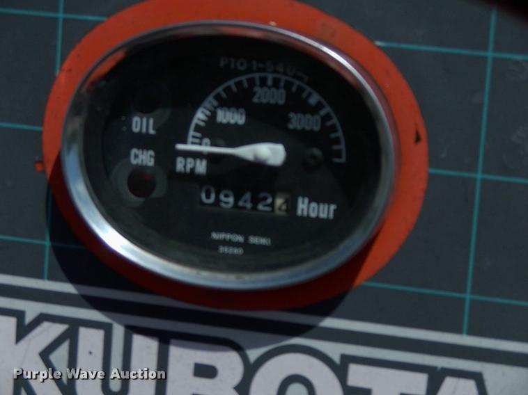 image for item L3128 Kubota L2350 MFWD tractor with petromat attachment