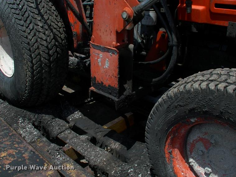 image for item L3128 Kubota L2350 MFWD tractor with petromat attachment