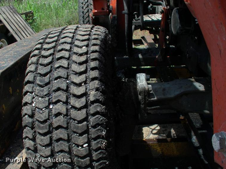 image for item L3128 Kubota L2350 MFWD tractor with petromat attachment