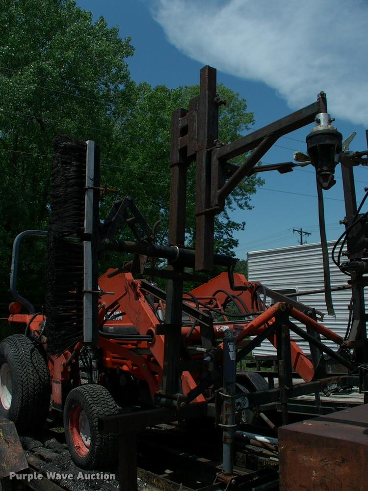 image for item L3128 Kubota L2350 MFWD tractor with petromat attachment