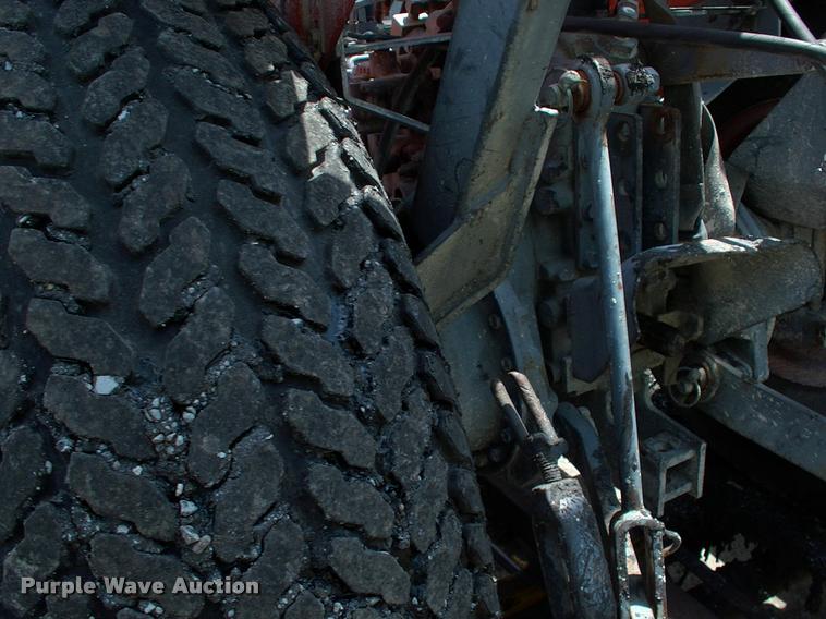 image for item L3128 Kubota L2350 MFWD tractor with petromat attachment