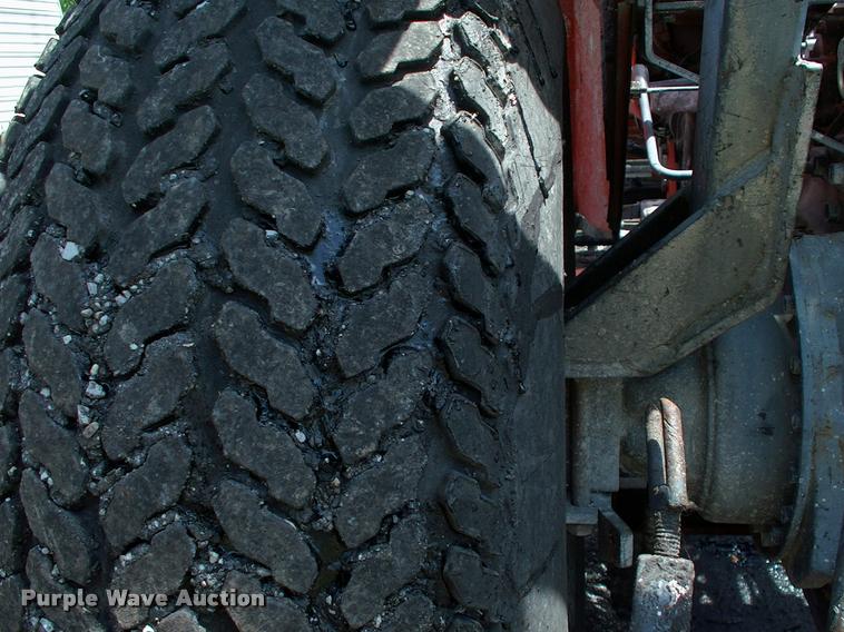 image for item L3128 Kubota L2350 MFWD tractor with petromat attachment