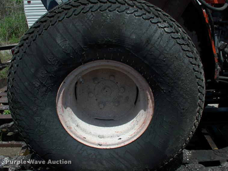 image for item L3128 Kubota L2350 MFWD tractor with petromat attachment