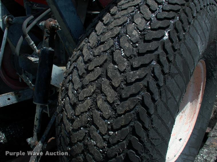 image for item L3128 Kubota L2350 MFWD tractor with petromat attachment