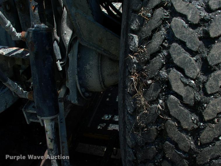 image for item L3128 Kubota L2350 MFWD tractor with petromat attachment