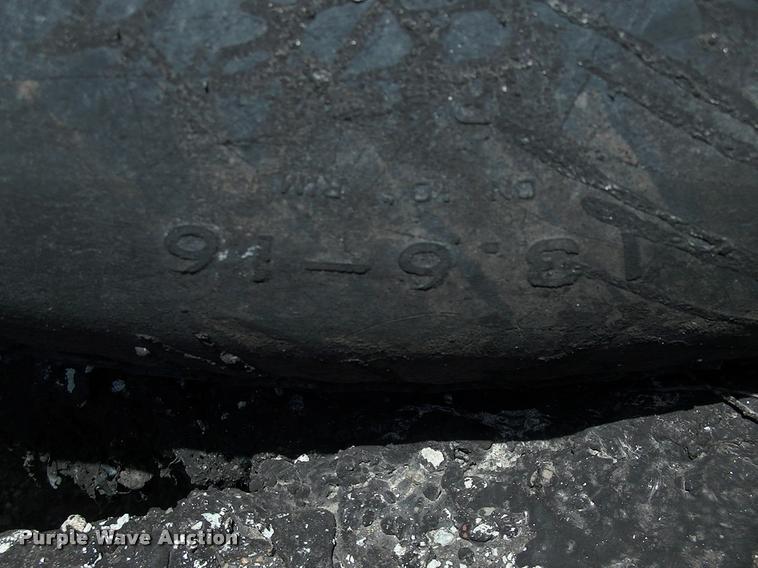 image for item L3128 Kubota L2350 MFWD tractor with petromat attachment