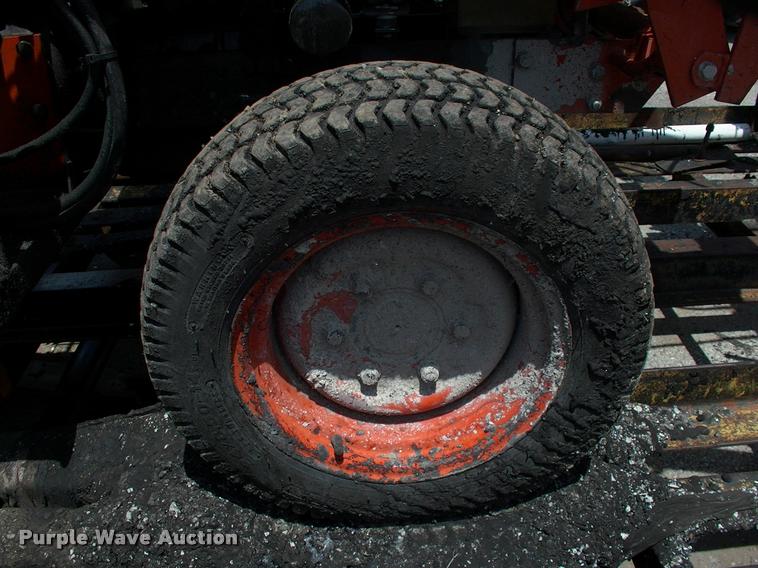 image for item L3128 Kubota L2350 MFWD tractor with petromat attachment