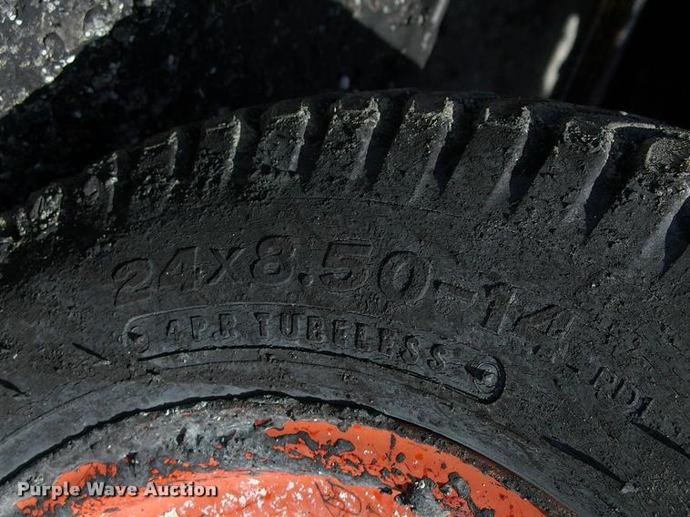 image for item L3128 Kubota L2350 MFWD tractor with petromat attachment