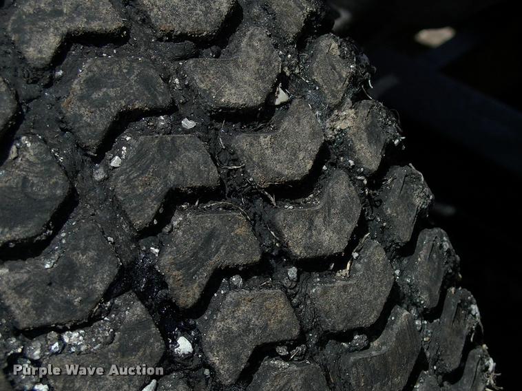 image for item L3128 Kubota L2350 MFWD tractor with petromat attachment