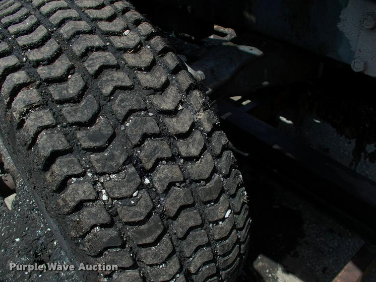 image for item L3128 Kubota L2350 MFWD tractor with petromat attachment