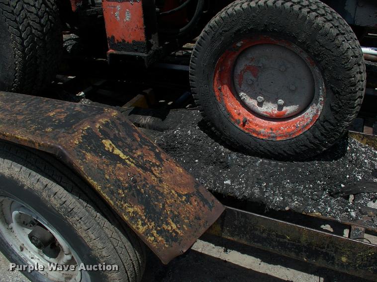 image for item L3128 Kubota L2350 MFWD tractor with petromat attachment