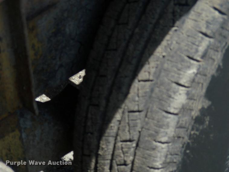 image for item L3128 Kubota L2350 MFWD tractor with petromat attachment