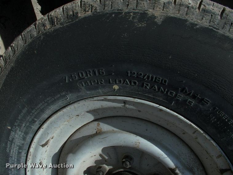 image for item L3128 Kubota L2350 MFWD tractor with petromat attachment