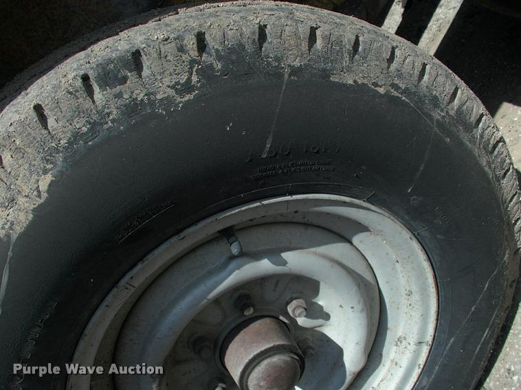 image for item L3128 Kubota L2350 MFWD tractor with petromat attachment