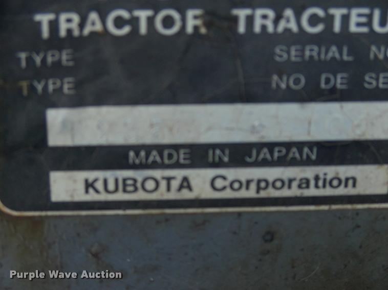 image for item L3128 Kubota L2350 MFWD tractor with petromat attachment