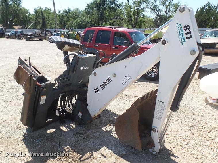 Bobcat 811 skid steer backhoe