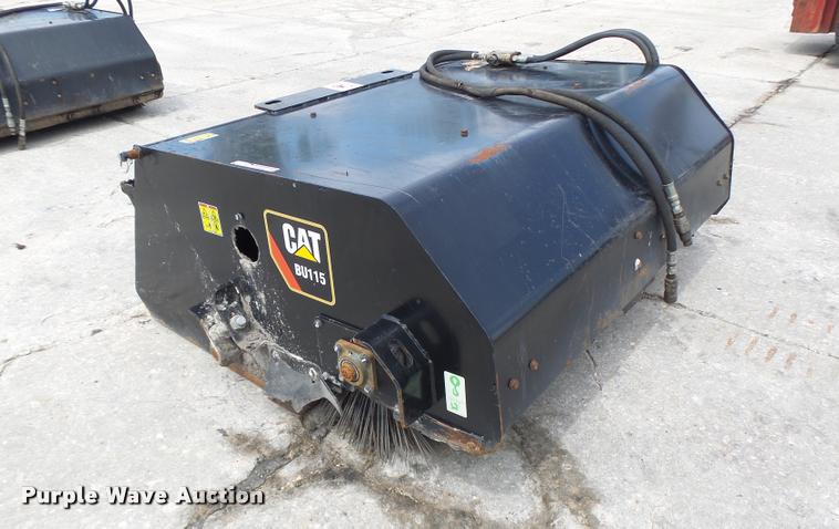 2014 Caterpillar BU115 skid steer sweeper