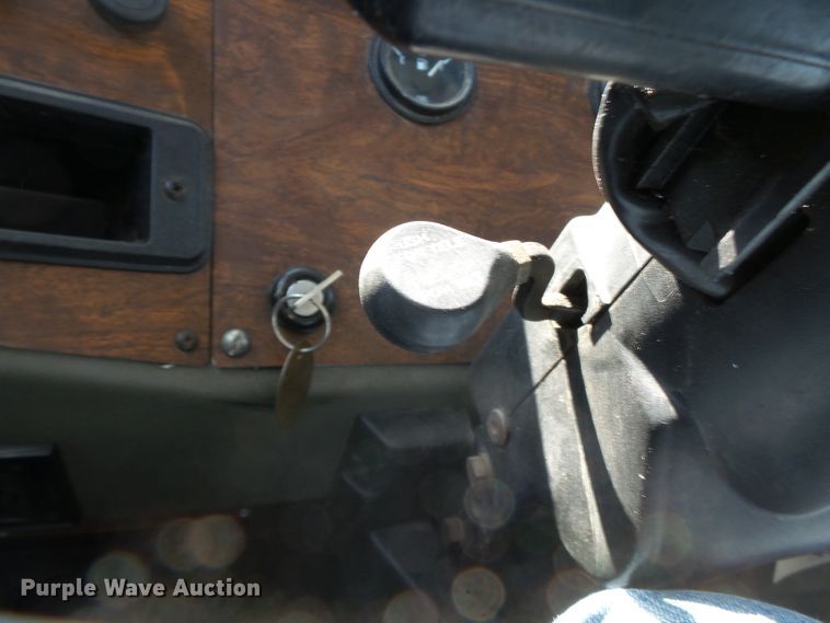 image for item DE7995 1997 Peterbilt 330 flatbed truck