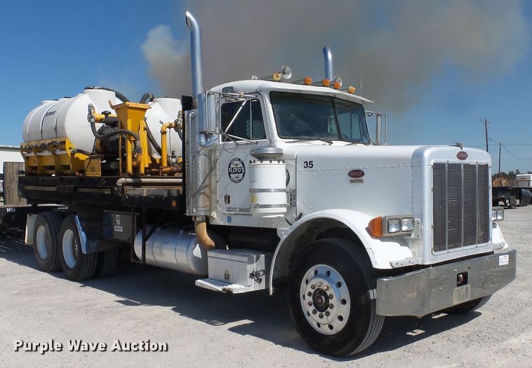 image for item DE8025 1990 Peterbilt 379 flatbed truck