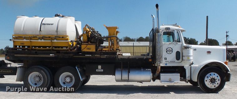 image for item DE8025 1990 Peterbilt 379 flatbed truck