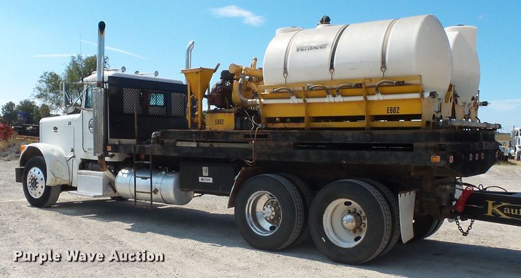 image for item DE8025 1990 Peterbilt 379 flatbed truck