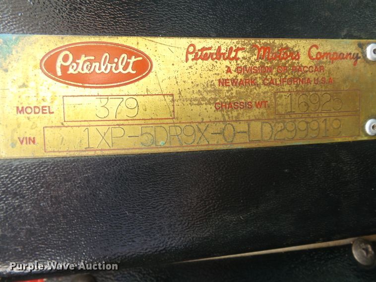 image for item DE8025 1990 Peterbilt 379 flatbed truck